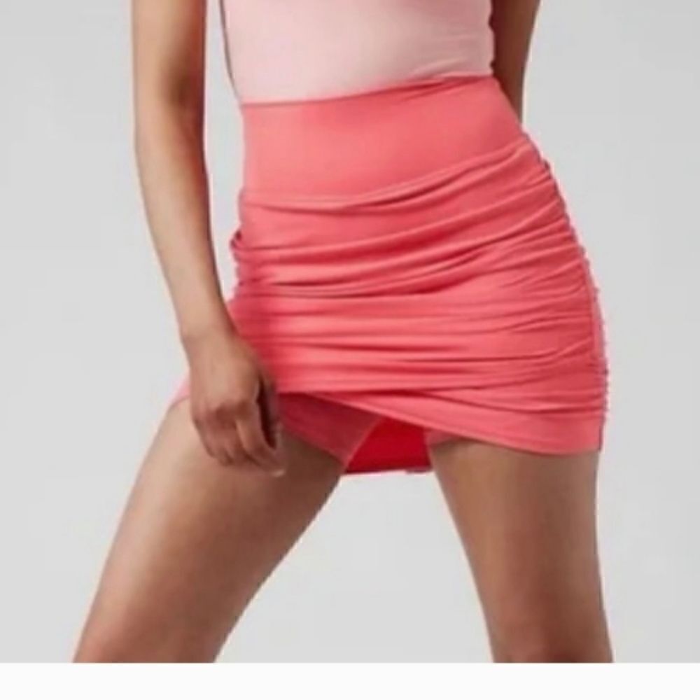 Athleta Transcend Skort. Coral petal pink color. Size XXS NWT